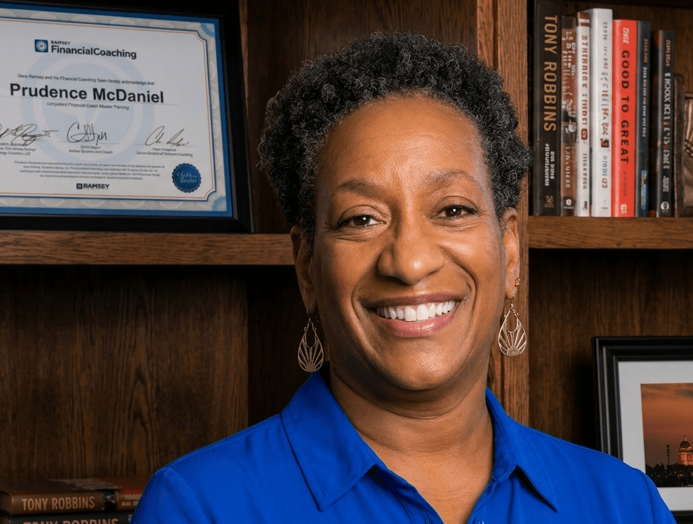 image of Prudence McDaniel standing in front of a bookcase